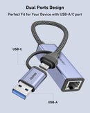 USB-C to USB-A adapter with dual ports on a light blue background