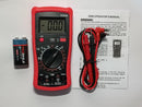 Digital multimeter with battery and cables on a white background