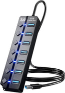 USB 3.0 hub with multiple ports and a cable on a white background